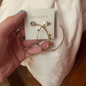 Cute gold hoop earrings with jeans/jewels
